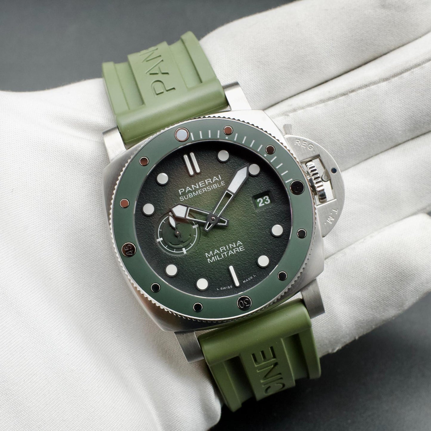 Panerai Submersible Marina Militare 3 Days Green dial with green straps held in hand