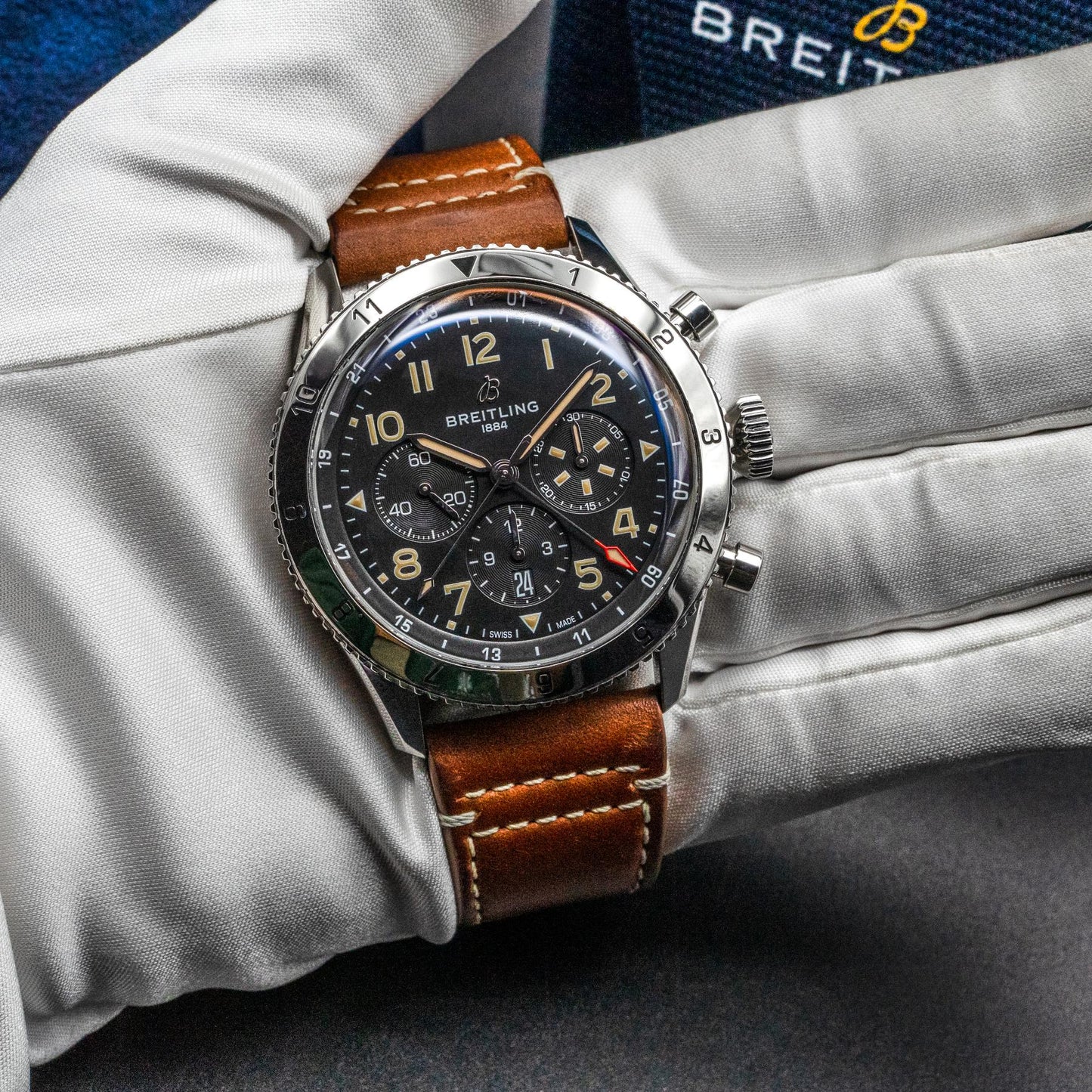Breitling Super AVI B04 GMT Chrono 46 P-51 held in hand