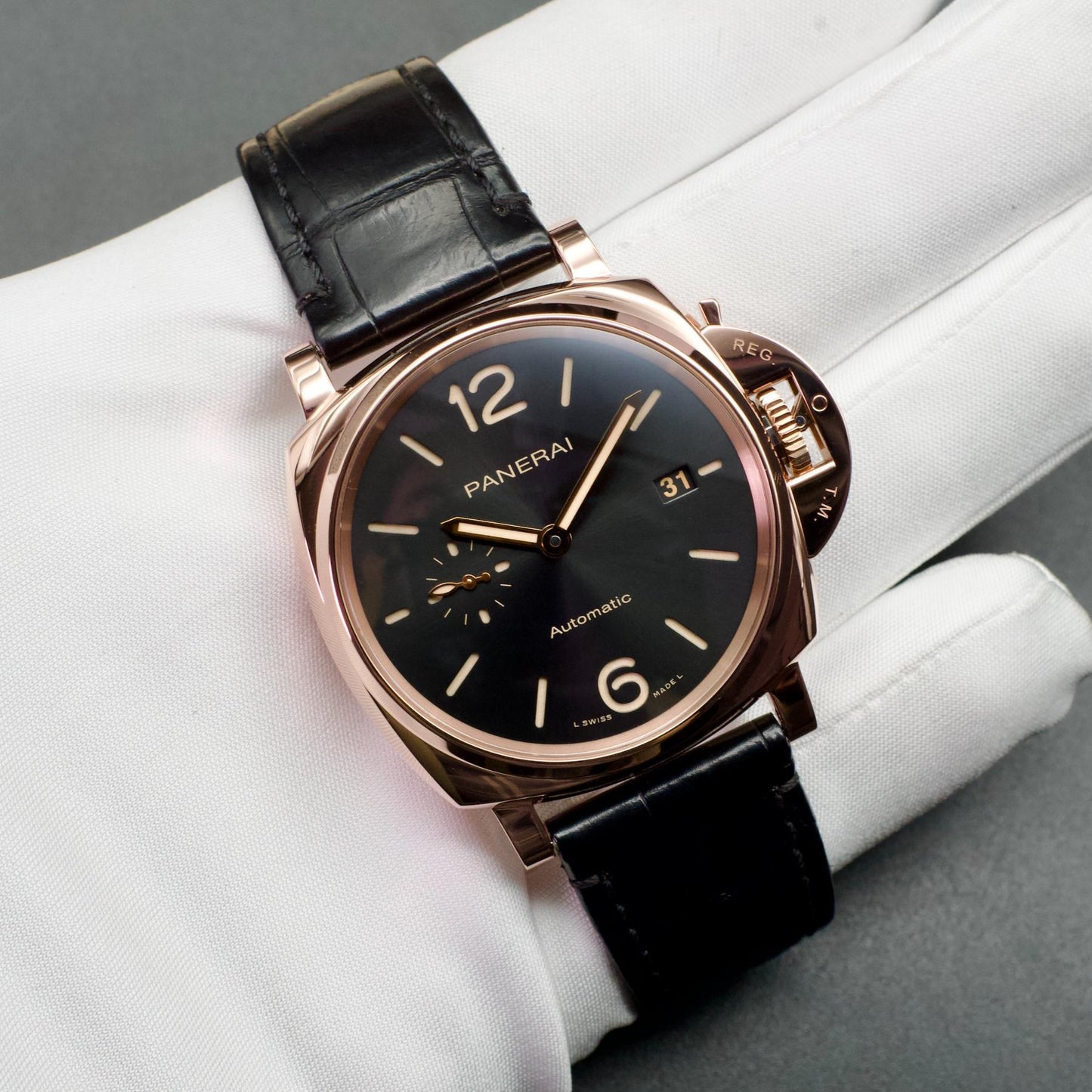 PAM01041 Luminor Due Goldtech Black Dial 42mm held in hand